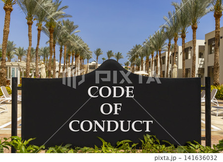 Code of conduct words symbol. Concept words Code of conduct on beautiful black road sign. Beautiful blue sky palm trees background. Business Code of conduct concept. Copy space. Code of conduct words symbol. Concept words Code of conduct on beautiful black road sign. Beautiful blue sky palm trees background. Business Code of conduct concept. Copy space. 141636032