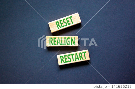 Reset realign restart words symbol. Concept words Reset realign restart on beautiful wooden blocks. Beautiful black background. Business motivational and reset realign restart concept. Copy space. Reset realign restart words symbol. Concept words Reset realign restart on beautiful wooden blocks. Beautiful black background. Business motivational and reset realign restart concept. Copy space. 141636215