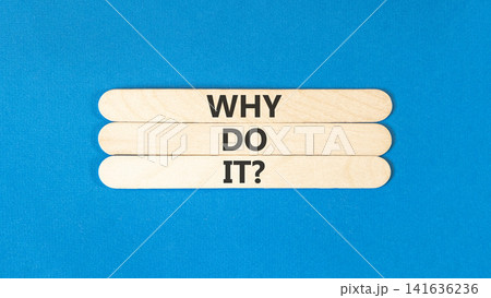 Why do it words symbol. Concept words Why do it on beautiful wooden sticks. Beautiful blue background. Business support motivational and Why do it concept. Copy space. Why do it words symbol. Concept words Why do it on beautiful wooden sticks. Beautiful blue background. Business support motivational and Why do it concept. Copy space. 141636236