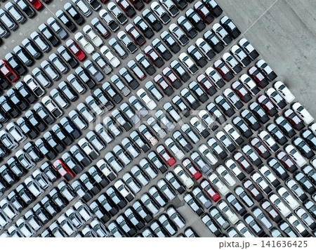 Auto industry. New vehicles in factory parking. Pickup truck and SUV. Fuel efficiency, emissions standards. Electric and hybrid technology. Logistics business. Import and export new cars at warehouse. Auto industry. New vehicles in factory parking. Pickup truck and SUV. Fuel efficiency, emissions standards. Electric and hybrid technology. Logistics business. Import and export new cars at warehouse. 141636425