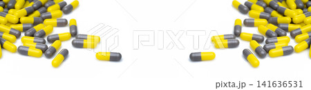 Closeup yellow and gray capsule pills on white background. Prescription drugs. Pharmaceutical industry. Health and medical care concept. Pharmacy products. Capsule pills production manufacturing. 141636531