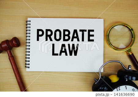 Probate Law text written on notepad with pen, alarm clock and judge gavel on wooden background 141636690