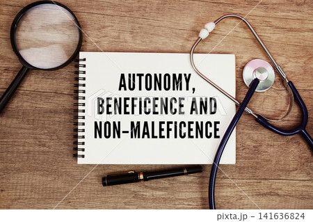 Autonomy, Beneficence and Non-Maleficence text written on notepad with stethoscope and magnifying glass on wooden background Autonomy, Beneficence and Non-Maleficence text written on notepad with stethoscope and magnifying glass on wooden background 141636824