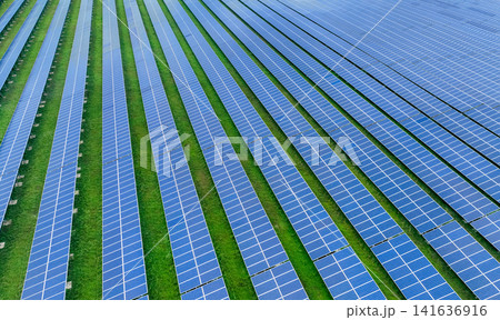 Solar farm and sun light. Solar power for green energy. Sustainable renewable energy. Photovoltaic power station or solar park. Solar panel installation and maintenance concept. Energy sustainability. Solar farm and sun light. Solar power for green energy. Sustainable renewable energy. Photovoltaic power station or solar park. Solar panel installation and maintenance concept. Energy sustainability. 141636916