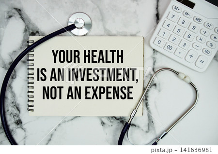 Your Health Is An Investment, Not An Expense text written on notepad with stethoscope and calculator on marble background Your Health Is An Investment, Not An Expense text written on notepad with stethoscope and calculator on marble background 141636981
