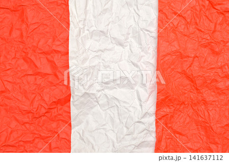 vertical white stripe of crumpled paper between orange parts vertical white stripe of crumpled paper between orange parts 141637112