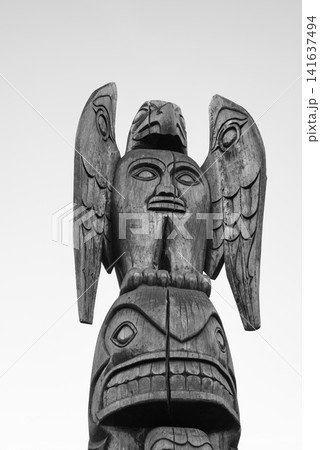 Wooden Totem poles in Duncan Canada outdoor museum in black and white Wooden Totem poles in Duncan Canada outdoor museum in black and white 141637494