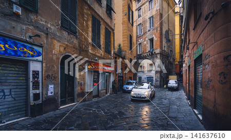 GENOA, ITALY - NOVEMBER 04, 2018 - Narrow streets of the old city GENOA, ITALY - NOVEMBER 04, 2018 - Narrow streets of the old city 141637610