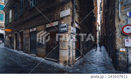 GENOA, ITALY - NOVEMBER 04, 2018 - Narrow streets of the old city GENOA, ITALY - NOVEMBER 04, 2018 - Narrow streets of the old city 141637611