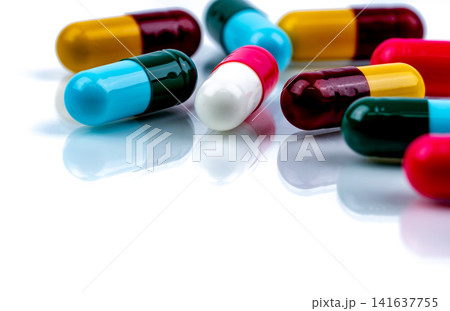 Colorful pharmaceutical capsule medication on white background, healthcare and pharmacy concept for prescription medicine, hospital treatment and medical industry. Pharmaceutical industry. 141637755