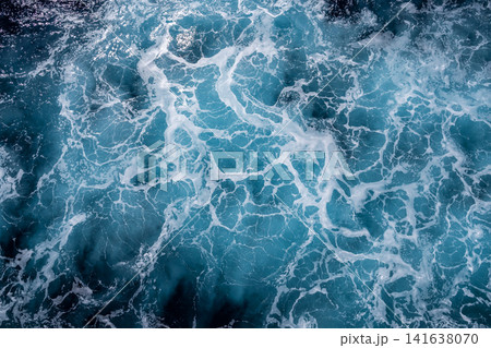 Rough deep turquoise and blue Mediterranean sea with white foam texture background	 141638070