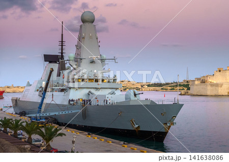 Valletta, Malta - Nov 7 2018, Panoramic view of the moored warship HMS Duncan D37 at sunset, without people, in the port of Valletta, Malta 141638086
