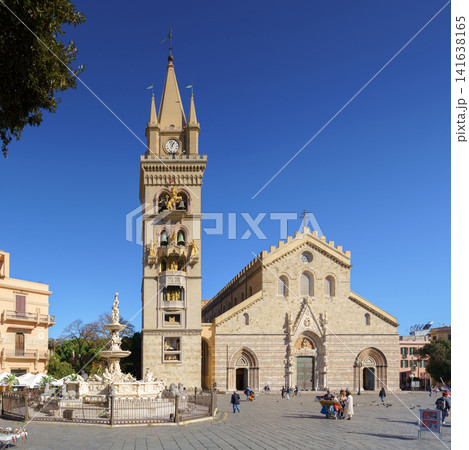 MESSINA, ITALY - NOVEMBER 06, 2018 - The bell tower with carillon of the Duomo Cathedral in Sicily MESSINA, ITALY - NOVEMBER 06, 2018 - The bell tower with carillon of the Duomo Cathedral in Sicily 141638165