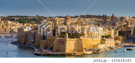 VALLETTA, MALTA - NOVEMBER 12, 2018 - Panoramic view of the Grand Harbor Tricity bay, Birgu and Senglea islands with ships and boats in the port VALLETTA, MALTA - NOVEMBER 12, 2018 - Panoramic view of the Grand Harbor Tricity bay, Birgu and Senglea islands with ships and boats in the port 141638185