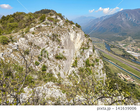 Climbing Garden Placca D Argento At Forte San Marco: Blossoming Trees Framing Cliffside Route In Spring Climbing Garden Placca D Argento At Forte San Marco: Blossoming Trees Framing Cliffside Route In Spring 141639006