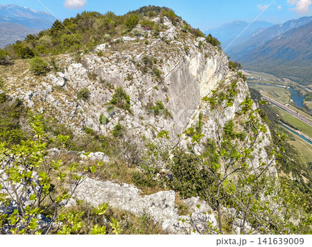 Climbing Garden Placca D Argento At Forte San Marco: Blossoming Trees Framing Cliffside Route In Spring Climbing Garden Placca D Argento At Forte San Marco: Blossoming Trees Framing Cliffside Route In Spring 141639009
