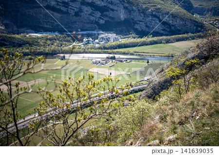 Adige Valley Panoramic View From Placca Del Forte San Marco: Scenic Spring Landscape Over Etsch Valley Near Lake Garda Adige Valley Panoramic View From Placca Del Forte San Marco: Scenic Spring Landscape Over Etsch Valley Near Lake Garda 141639035
