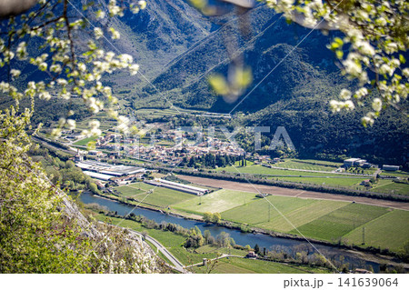 Adige River Valley And Dolci Village Viewed From Placca Del Forte San Marco: Panoramic Spring Landscape Near Lake Garda Adige River Valley And Dolci Village Viewed From Placca Del Forte San Marco: Panoramic Spring Landscape Near Lake Garda 141639064