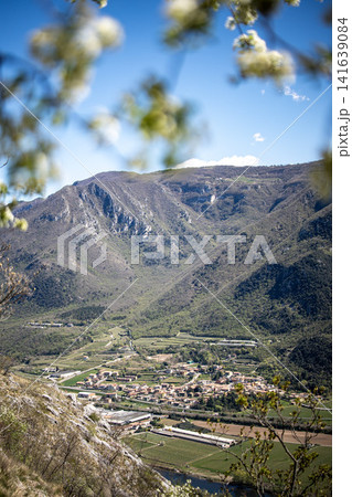 Adige River Valley And Dolci Village Viewed From Placca Del Forte San Marco: Panoramic Spring Landscape Near Lake Garda Adige River Valley And Dolci Village Viewed From Placca Del Forte San Marco: Panoramic Spring Landscape Near Lake Garda 141639084