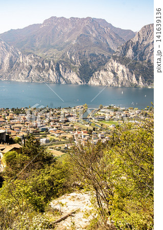 Panoramic View Over Riva Del Garda From Belvedere Climbing Garden: Scenic Landscape In Province Of Trento At Lake Garda Italy Panoramic View Over Riva Del Garda From Belvedere Climbing Garden: Scenic Landscape In Province Of Trento At Lake Garda Italy 141639136
