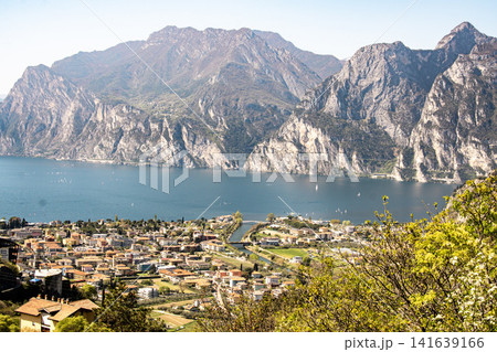 Panoramic View Over Riva Del Garda From Belvedere Climbing Garden: Scenic Landscape In Province Of Trento At Lake Garda Italy Panoramic View Over Riva Del Garda From Belvedere Climbing Garden: Scenic Landscape In Province Of Trento At Lake Garda Italy 141639166
