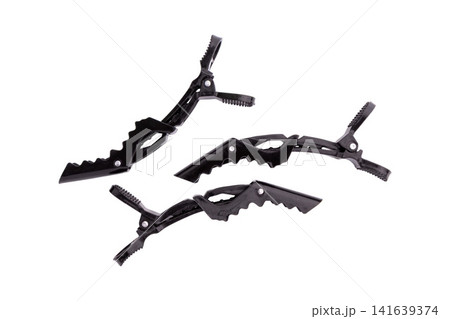 black plastic hair clips isolated black plastic hair clips isolated 141639374