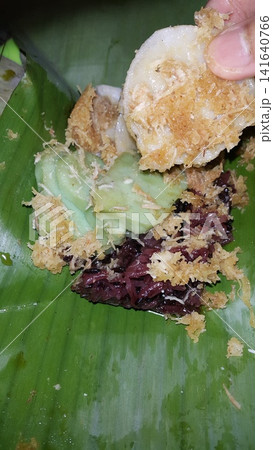 Shot of Serabi which is a traditional market snack originating from Indonesia. Shot of Serabi which is a traditional market snack originating from Indonesia. 141640766