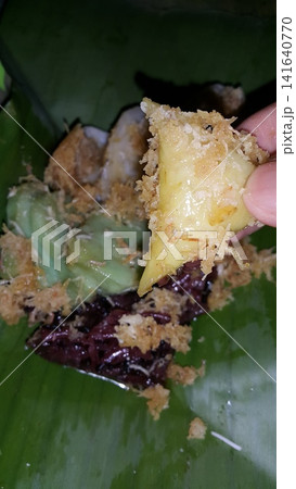 A shot of Lupis cake, a traditional Indonesian food. Selective Focus. 141640770