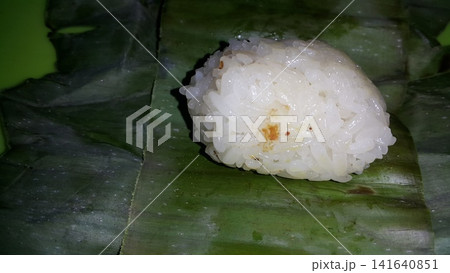 Indonesian Tradisional food called lemper contain rice cake with chicken inside. 141640851