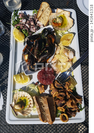 Assorted Seafood Platter with Mussels Shrimp and Octopus 141641318