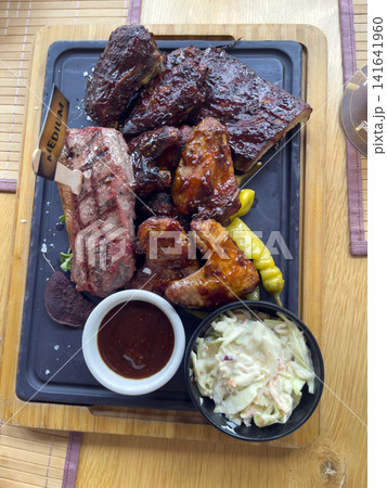 Overhead View of Mixed Grill with Ribs Steak and Chicken Overhead View of Mixed Grill with Ribs Steak and Chicken 141641960