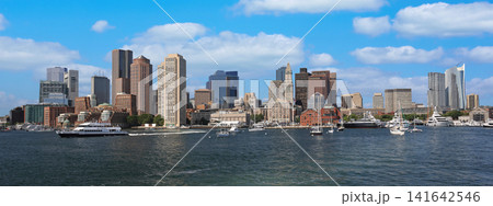 Boston skyline with passengers boats sailing on the foreground, USA Boston skyline with passengers boats sailing on the foreground, USA 141642546
