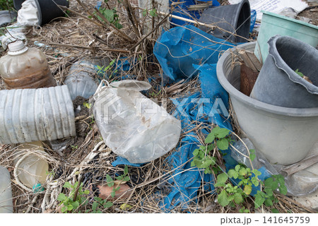 Items are discarded and piled up in garbage, which has a negative impact on the environment. 141645759