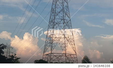 high voltage tower at sunset high voltage tower at sunset 141646108