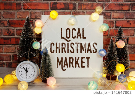 Local Christmas Market Display with LED Lights Cotton Balls and Mini Trees Local Christmas Market Display with LED Lights Cotton Balls and Mini Trees 141647802