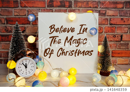 Believe In The Magic Of Christmas Display with LED Lights Cotton Balls and Mini Trees Believe In The Magic Of Christmas Display with LED Lights Cotton Balls and Mini Trees 141648359