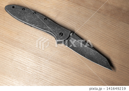 Black folding pocket knife with a stonewashed steel blade 141649219