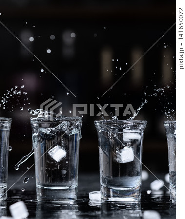 Vodka shots splash party celebration alcohol Vodka shots splash party celebration alcohol 141650072