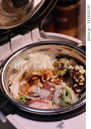Raw Ingredients in Stainless Steel Cooking Pot Raw Ingredients in Stainless Steel Cooking Pot 141650192