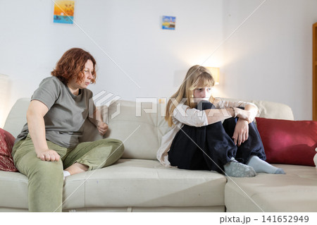 Mother and daughter having conflict over problems and stress Mother and daughter having conflict over problems and stress 141652949