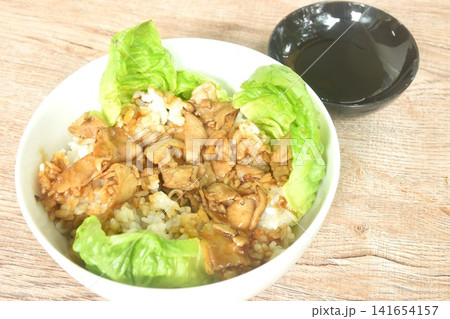 fried slice pork with teriyaki sauce eat couple lettuce on japanese rice in bowl dipping shoyu fried slice pork with teriyaki sauce eat couple lettuce on japanese rice in bowl dipping shoyu 141654157