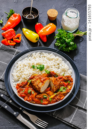 German Frikadelle in Sweet Pepper Lecho With Rice German Frikadelle in Sweet Pepper Lecho With Rice 141655793