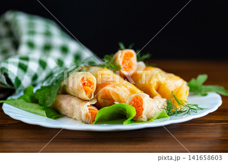 Healthy Korean cabbage appetizer with marinated vegetable filling Healthy Korean cabbage appetizer with marinated vegetable filling 141658603