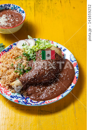 Celebrate Mexican flavors with mole poblano for Mexican independence day fiestas patrias Celebrate Mexican flavors with mole poblano for Mexican independence day fiestas patrias 141659252
