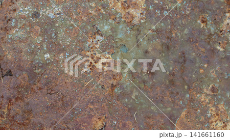 Abstract background texture of corroded metal surface with rusty patina and flaking blue paint Abstract background texture of corroded metal surface with rusty patina and flaking blue paint 141661160