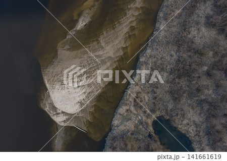 Aerial sandbank and dark river near the Vistula by Warsaw in late cold light 141661619