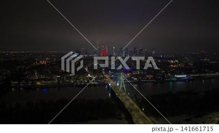 Aerial night view of Warsaw with Swietokrzyski Bridge and skyline Aerial night view of Warsaw with Swietokrzyski Bridge and skyline 141661715