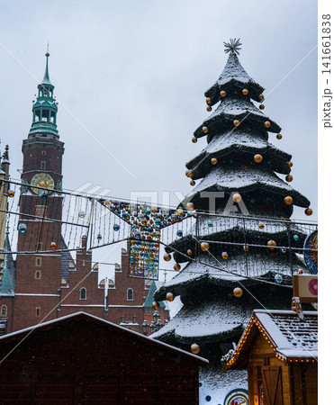Wroclaw Rynek Christmas market with Old Town Hall tower and tree Wroclaw Rynek Christmas market with Old Town Hall tower and tree 141661838
