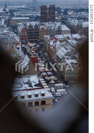 Aerial winter view of Wroclaw Rynek with St. Mary Magdalene towers Aerial winter view of Wroclaw Rynek with St. Mary Magdalene towers 141661873