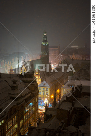 Snowy night over Wroclaw Old Town Hall tower and market square Snowy night over Wroclaw Old Town Hall tower and market square 141661880